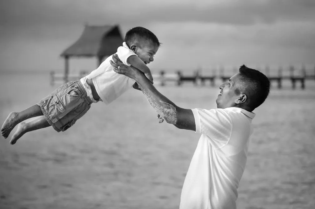 Father and Son Playing
