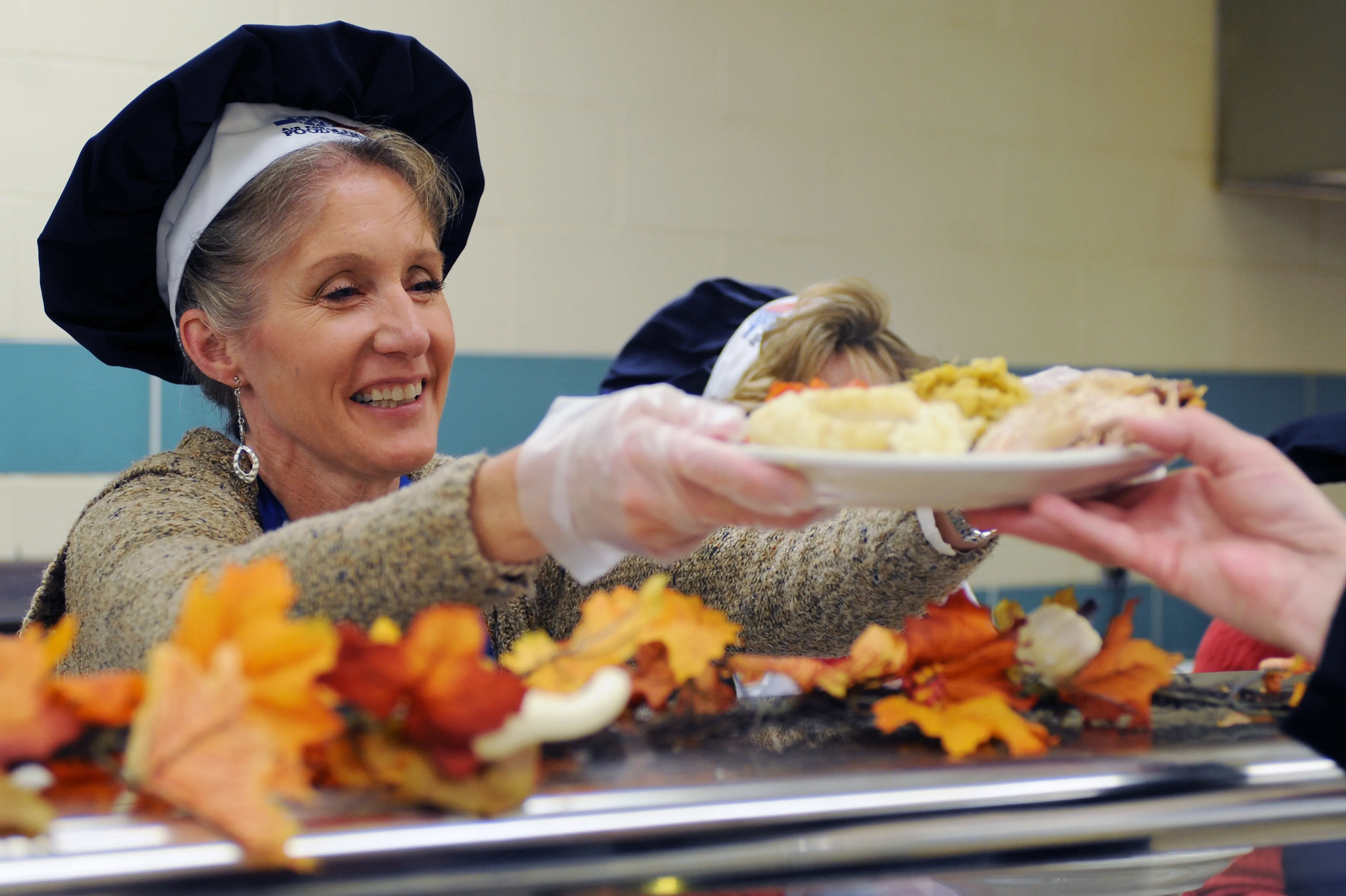 Woman Serving Food